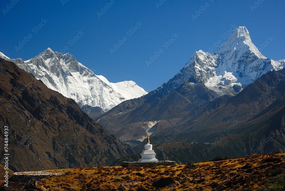 Buddhist Khumjung Stupa, Lhotse Peak and Ama Dablam Peak in Nepa