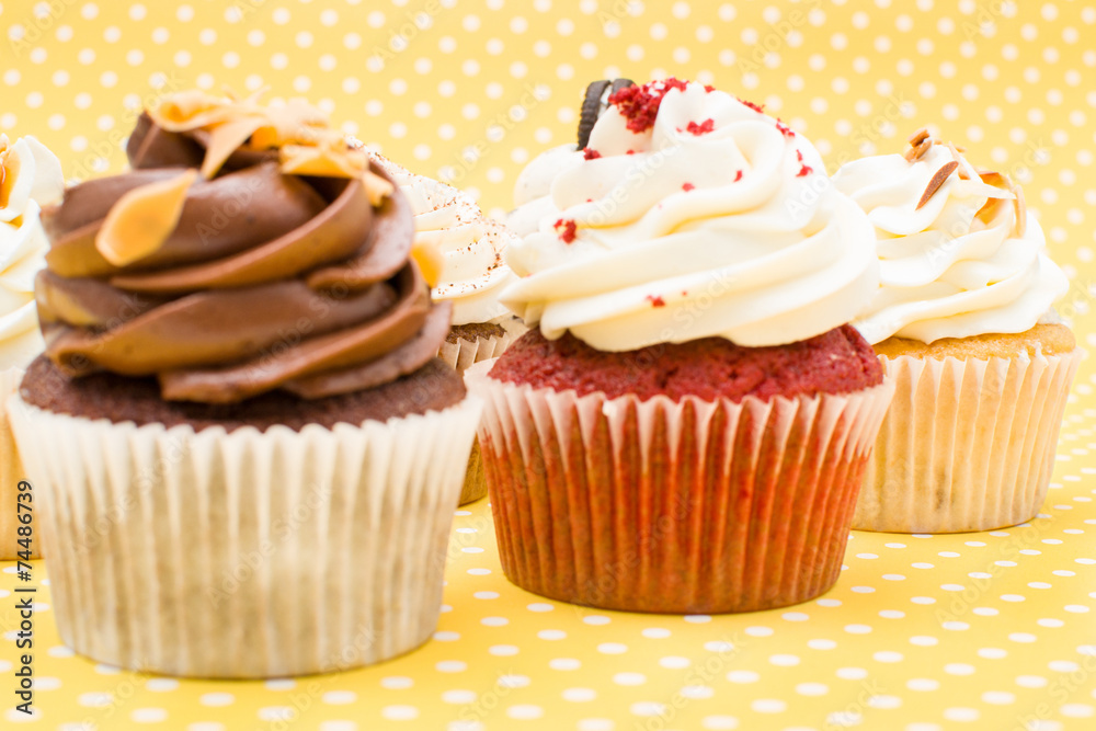 Cupcakes on yellow background