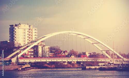 Retro vintage filtered picture of a bridge in Kolobrzeg, Poland.