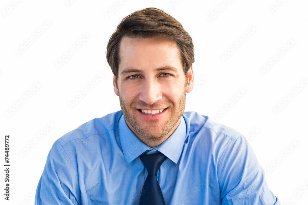 Casual businessman smiling at camera Casual businessman smiling at camera