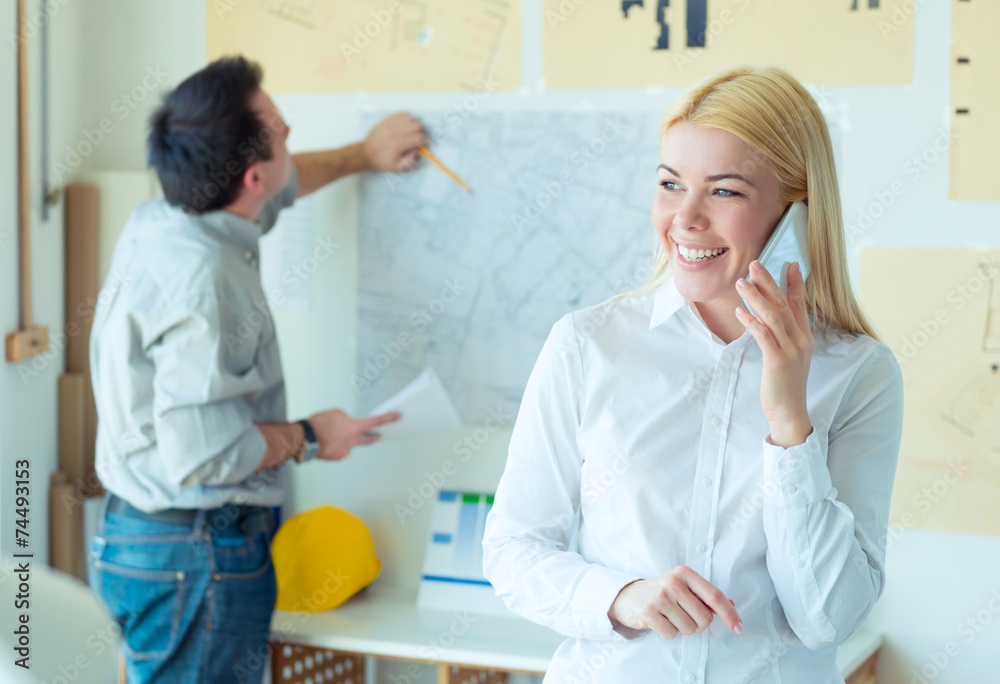 Fototapeta premium Businesswoman holding a mobile phone