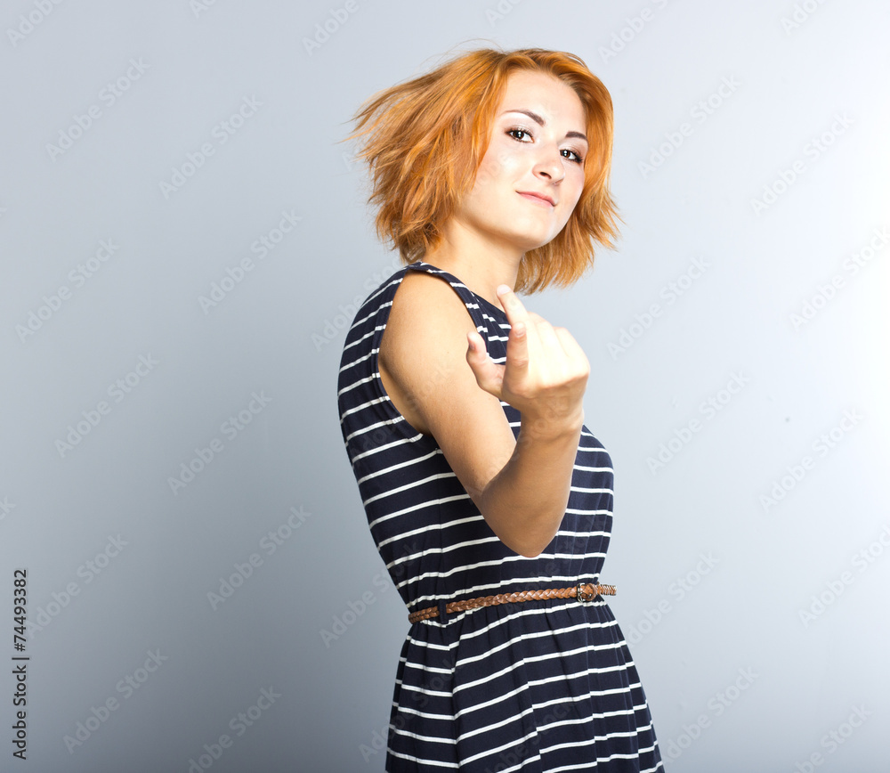 Beautiful young girl in a short cocktail dress. Beautiful young girl in a short cocktail dress.