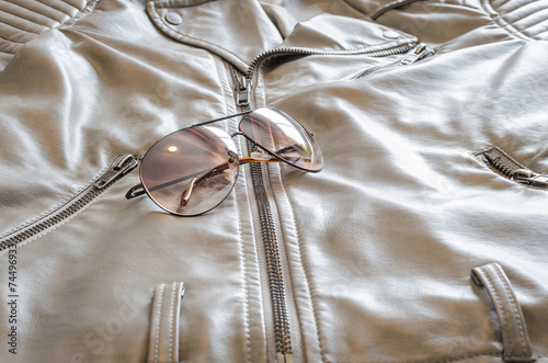 fashion sunglasses on jacket