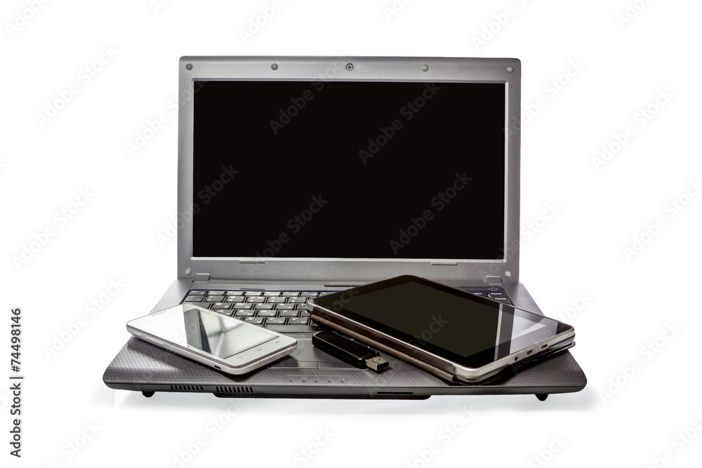 Smartphone, USB flash drive, the Tablet and laptop on white bac Smartphone, USB flash drive, the Tablet and laptop on white bac