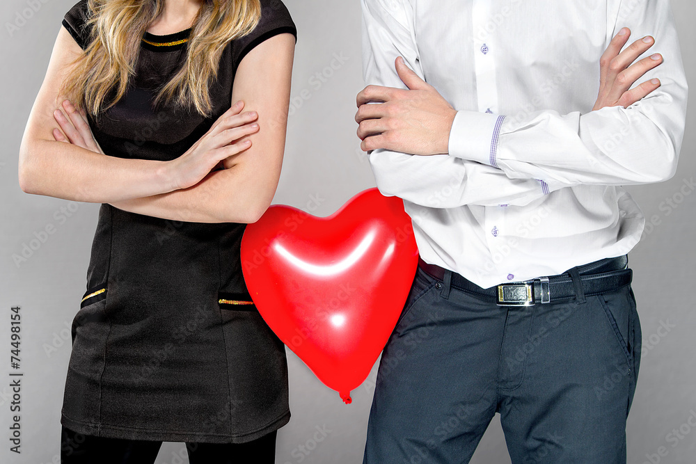 couple with heart balloon between them couple with heart balloon between them