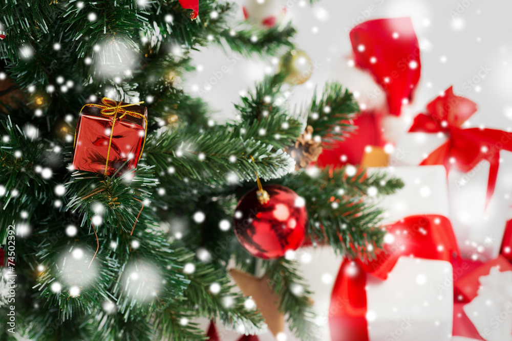 close up of christmas tree and presents close up of christmas tree and presents