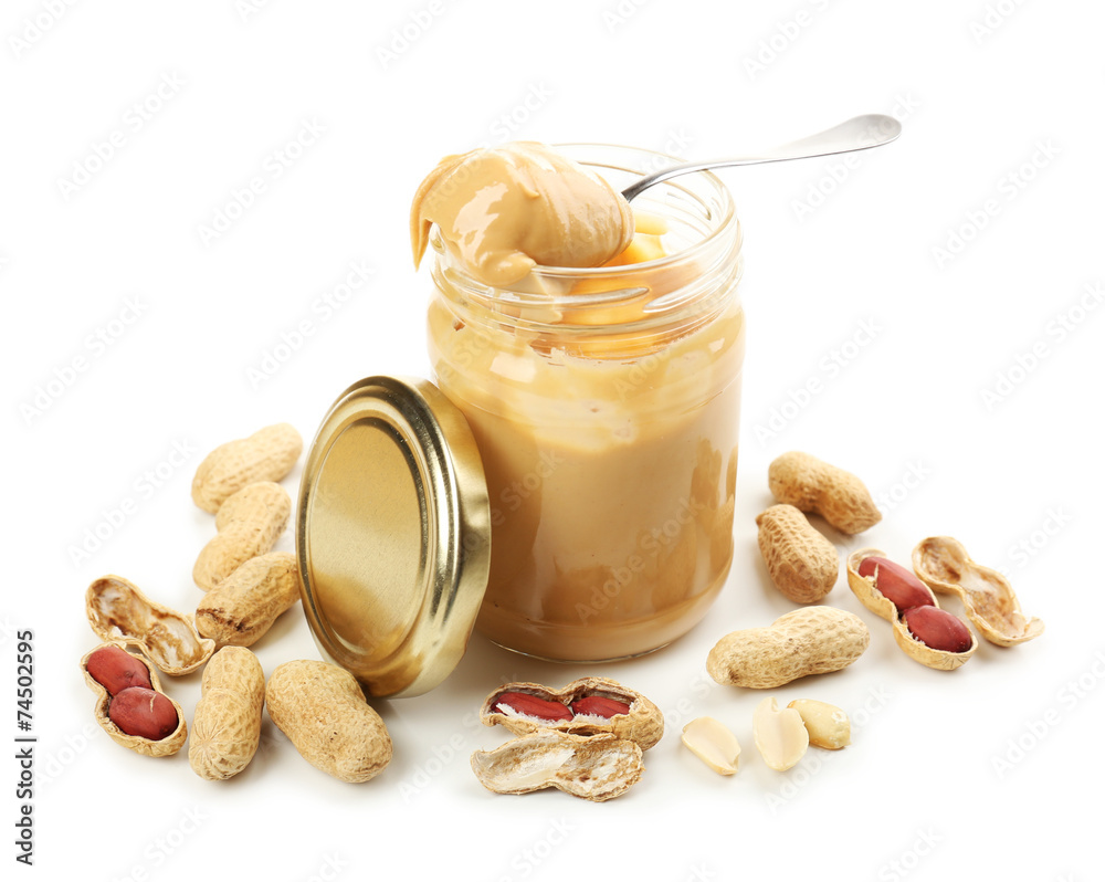 Creamy peanut butter in jar, isolated on white Creamy peanut butter in jar, isolated on white