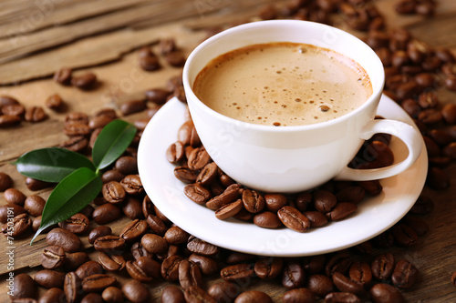 Cup of coffee on wooden table