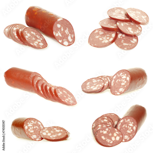 sausage cut by slices on a white background