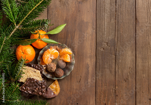 Fototapeta Naklejka Na Ścianę i Meble -  Chocolate, truffles and tangerins