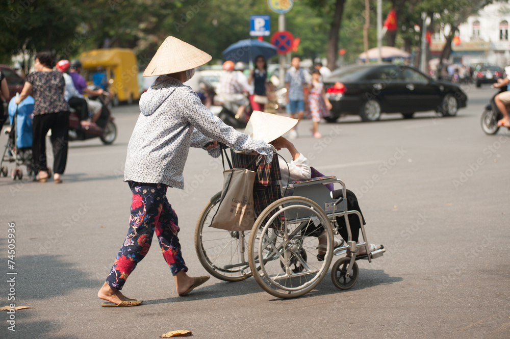 Wheelchair on street in Hanoi,Vietnam.