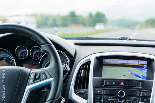 Car interior driving and navigation © kralovecphoto