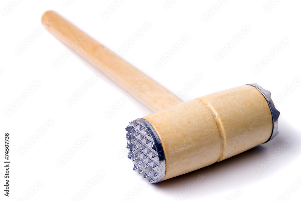Close up view of a meat hammer isolated on a white background.