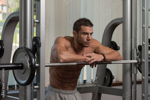 Healthy Young Man Resting In Health Club