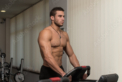 Exercising On A Treadmill © Jale Ibrak