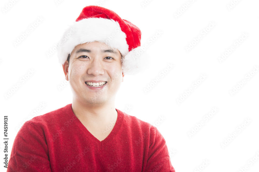Young asian man with Christmas hat isolated on white. Young asian man with Christmas hat isolated on white.