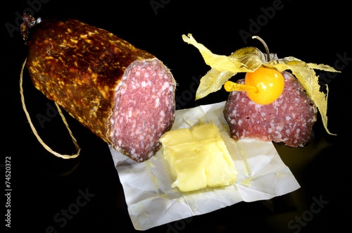 Sausage, butter and physalis