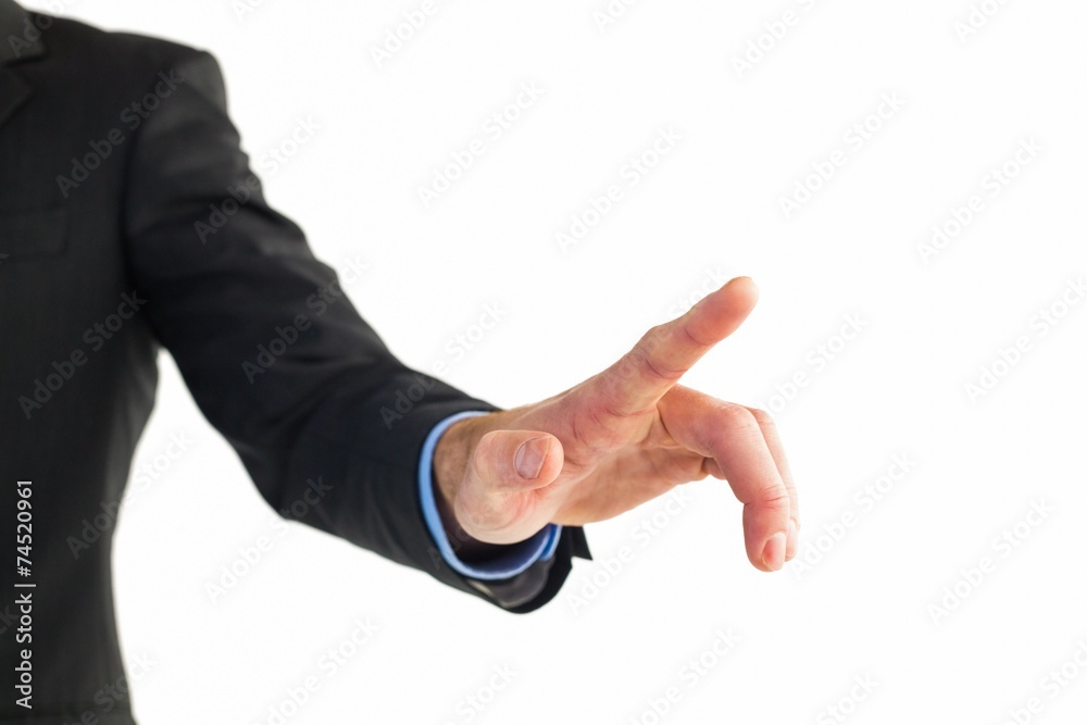 Fototapeta premium Businessman hand pointing something