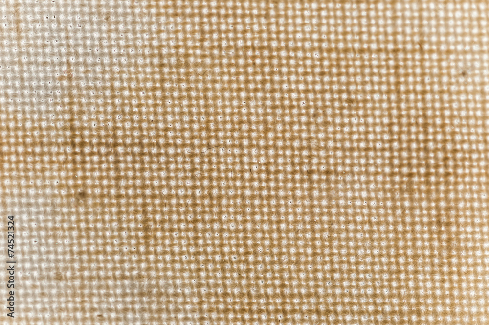 Texture of a yellow brown canvas Texture of a yellow brown canvas