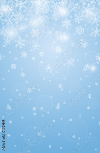 Abstract vertical christmas background with snowflakes.