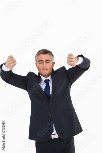 Elegant businessman with his arms out