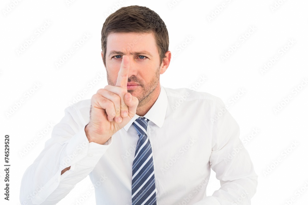 Businessman pointing with his finger Businessman pointing with his finger
