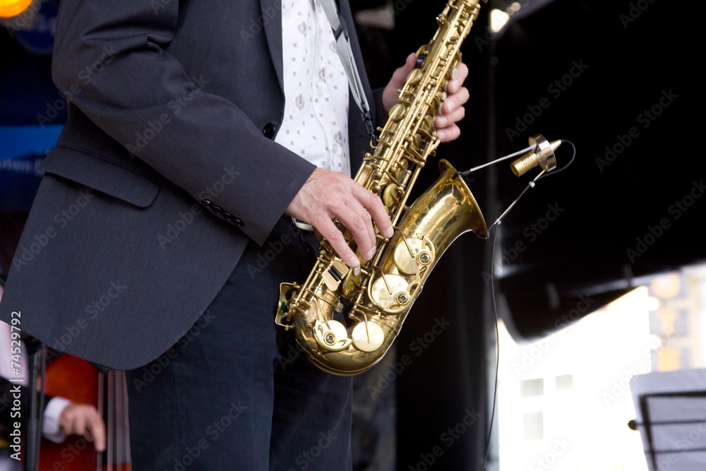 Naklejka premium Saxofon Spieler