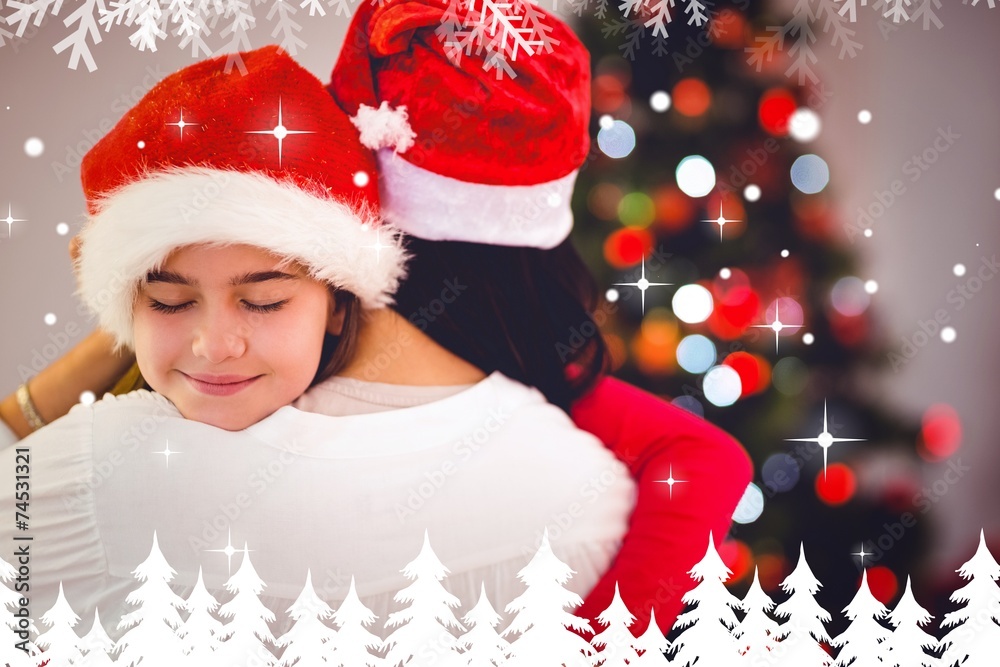 Composite image of mother and daughter hugging at christmas