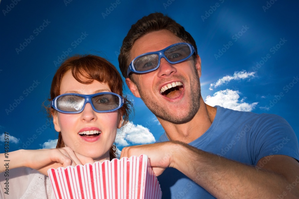 Obraz premium Composite image of couple enjoying a movie night