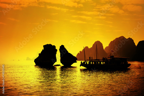Halong Bay in sunset, Vietnam. Unesco World Heritage Site.
