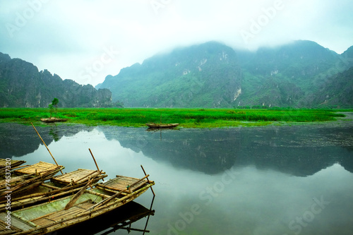 Fototapeta Naklejka Na Ścianę i Meble -  Tourist boats in Van Long. The famous eco tourism of  Vietnam.