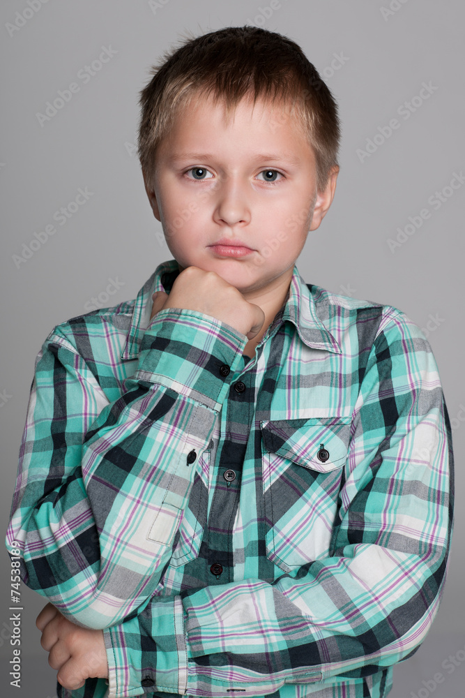 Portrait of an upset boy Portrait of an upset boy