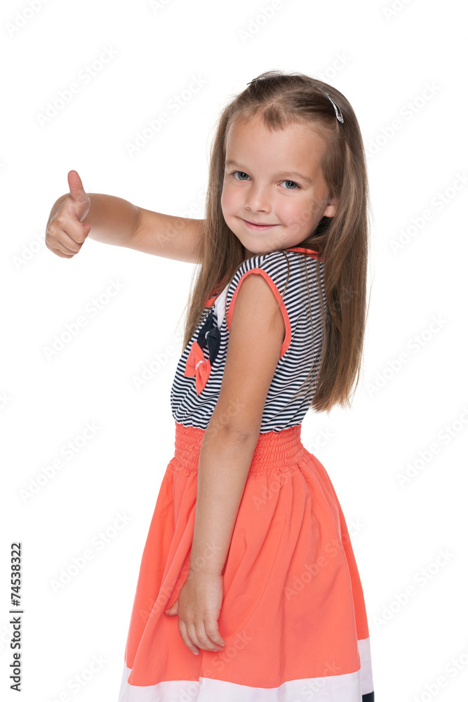 Little girl with her thumb up looks back Little girl with her thumb up looks back