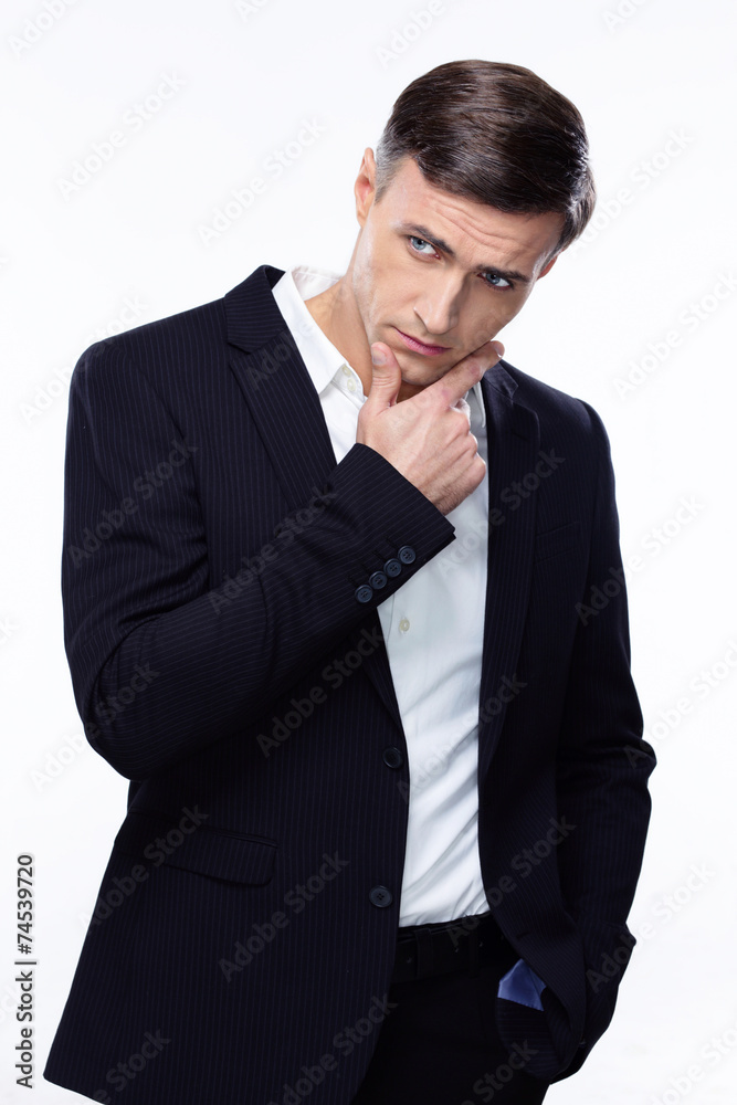 Portrait of a pensive businessman isolated on a white background Portrait of a pensive businessman isolated on a white background