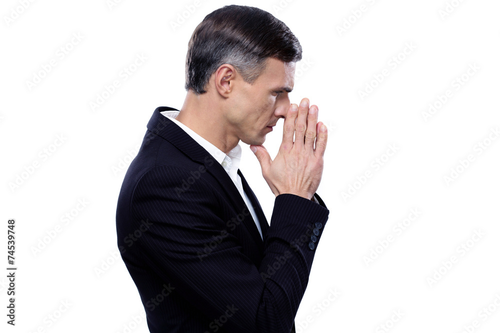 Side view portrait of a pensive businessman Side view portrait of a pensive businessman