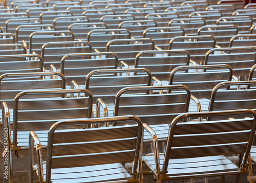 Empty metal seats places in public space