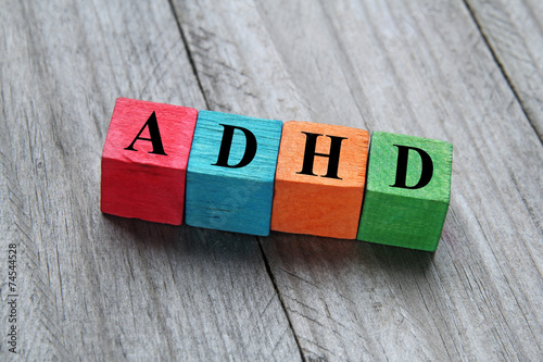 concept of ADHD on colorful wooden cubes photo