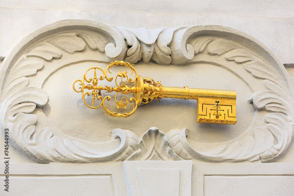 Fototapeta premium Gold key, house motif. Prague, Czech Republic
