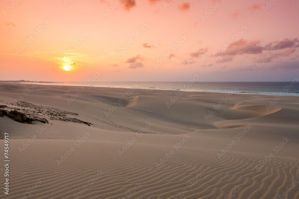 Sunset on sand dunes  in Chaves beach Praia de Chaves in Boavist
