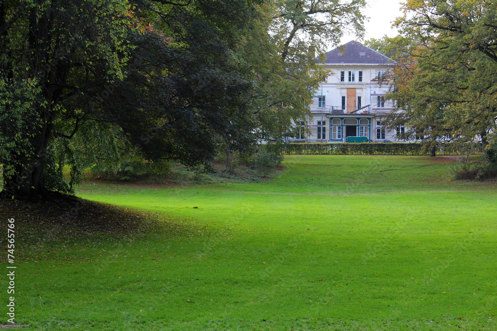 Fototapeta premium The view of the house in the park