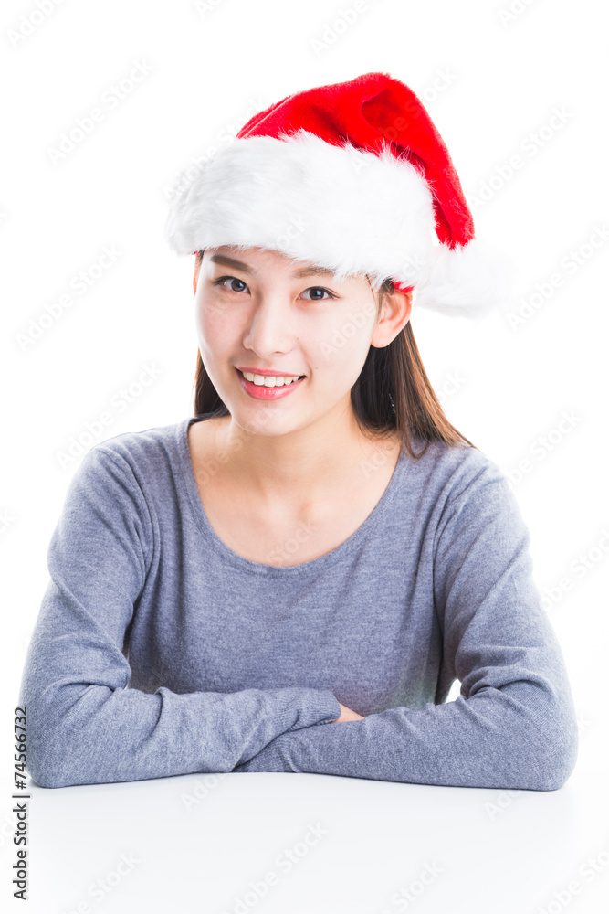 Young asian woman with Christmas hat isolated on white. Young asian woman with Christmas hat isolated on white.