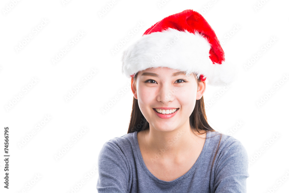 Young asian woman with Christmas hat isolated on white. Young asian woman with Christmas hat isolated on white.