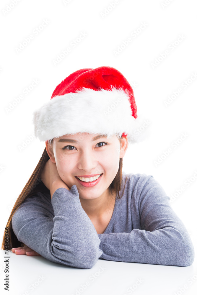 Young asian woman with Christmas hat isolated on white. Young asian woman with Christmas hat isolated on white.