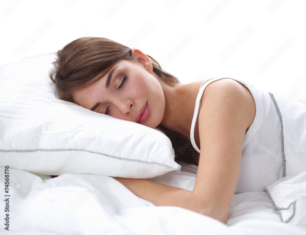 Beautiful girl sleeps in the bedroom, lying on bed Beautiful girl sleeps in the bedroom, lying on bed