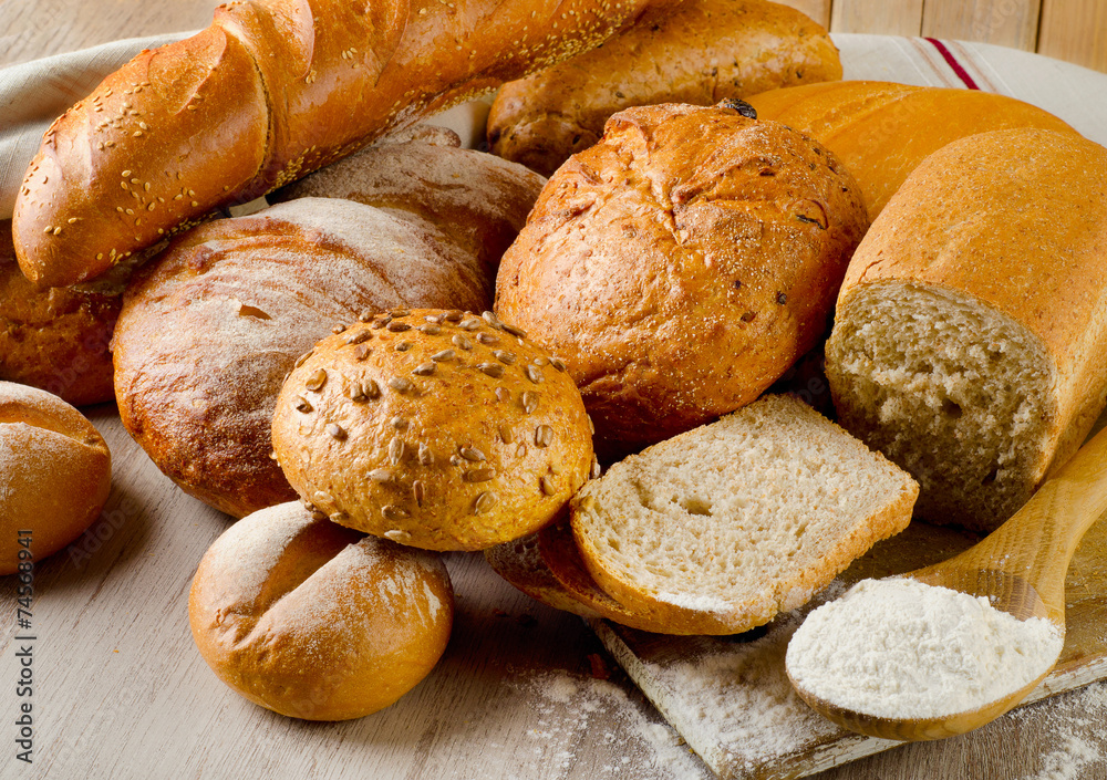 Fresh healthy natural bread on a wooden table