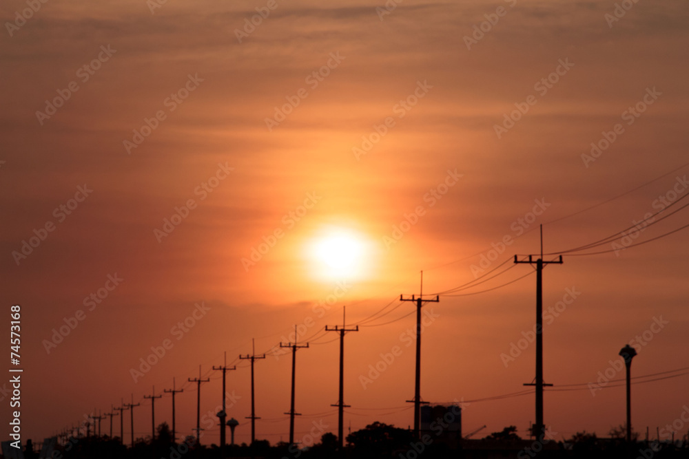 The Sun and the electrical poles.