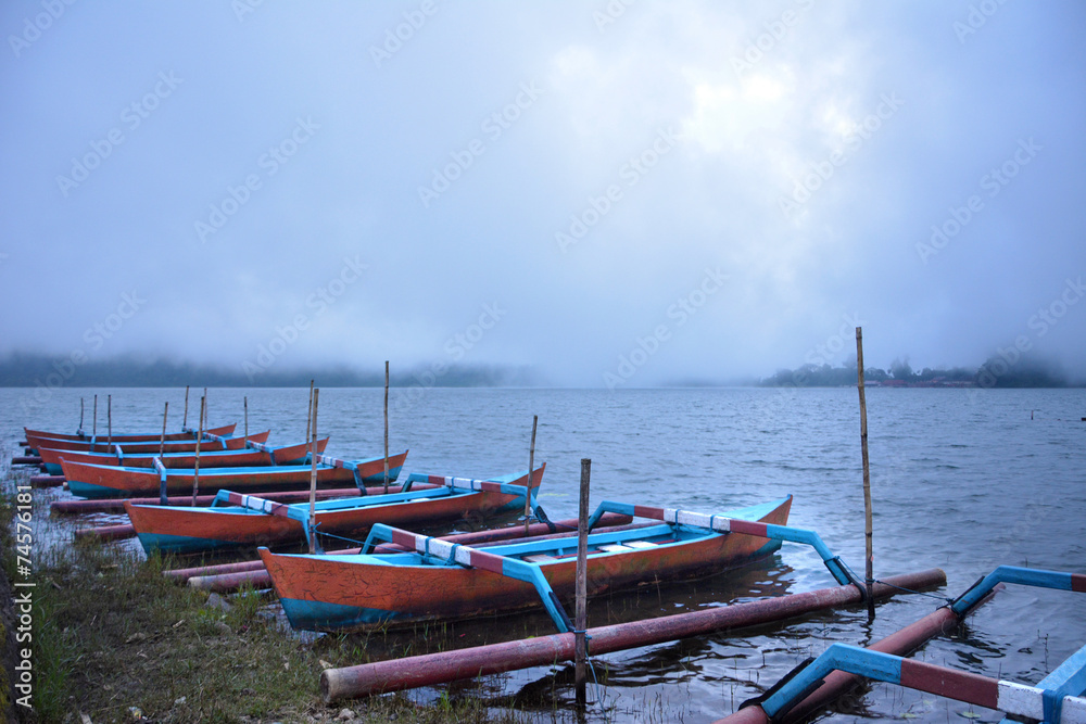 Boats in the misty twilight