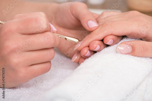 client and manicurist in manicure salon