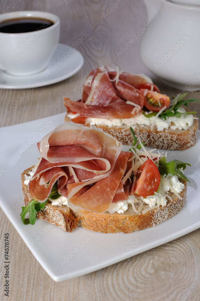 Sandwich of jamon with ricotta, arugula and cheese Sandwich of jamon with ricotta, arugula and cheese