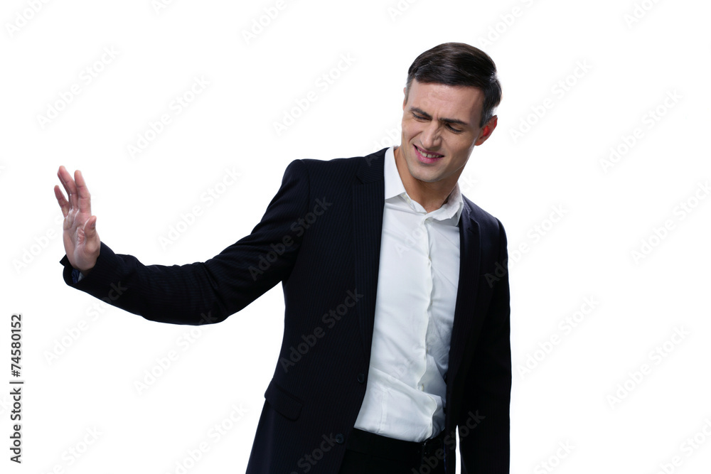 Businessman expressing refusal with open hand Businessman expressing refusal with open hand